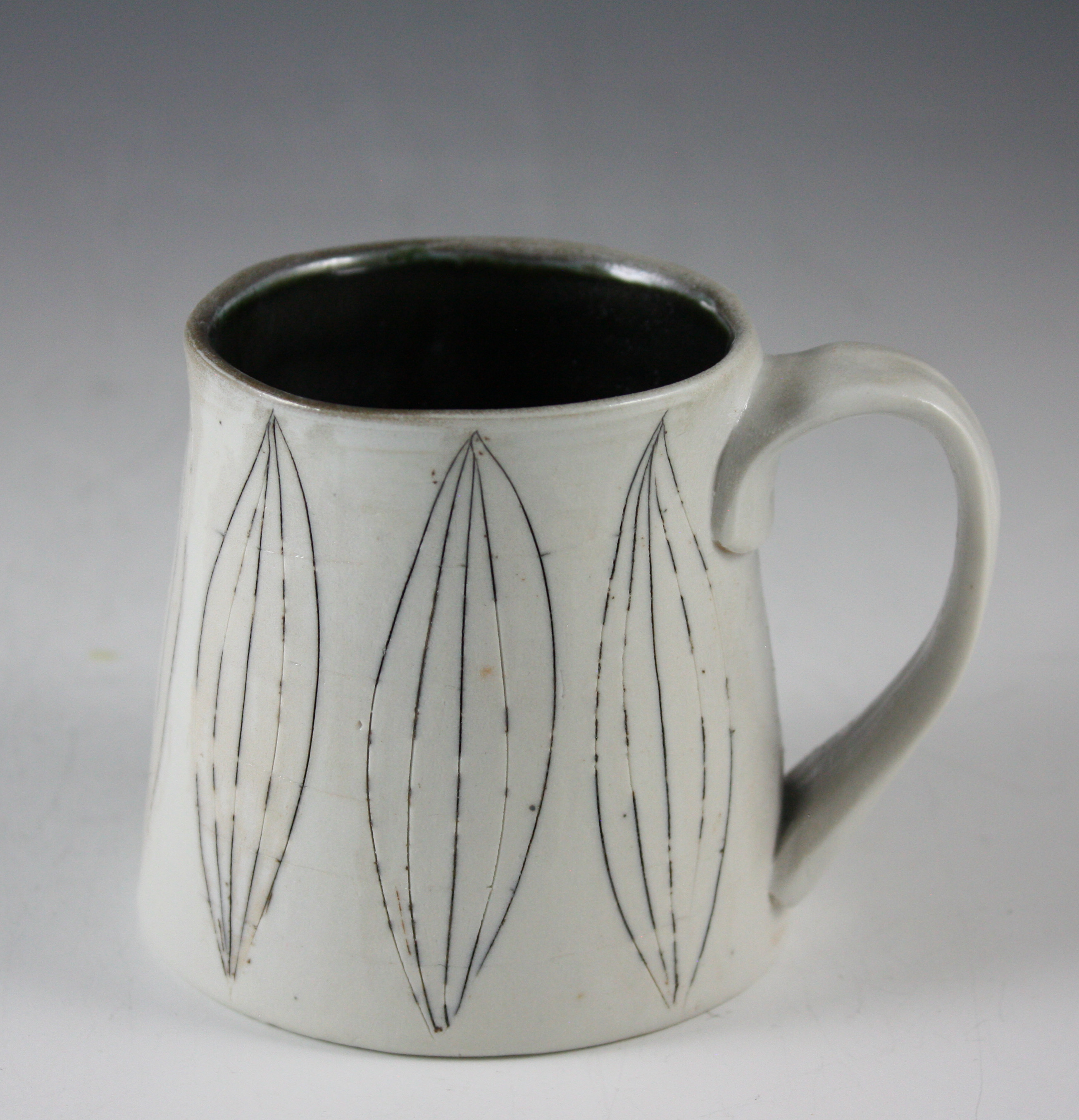 Porcelain Mug with incised Black Slip Design 21-290